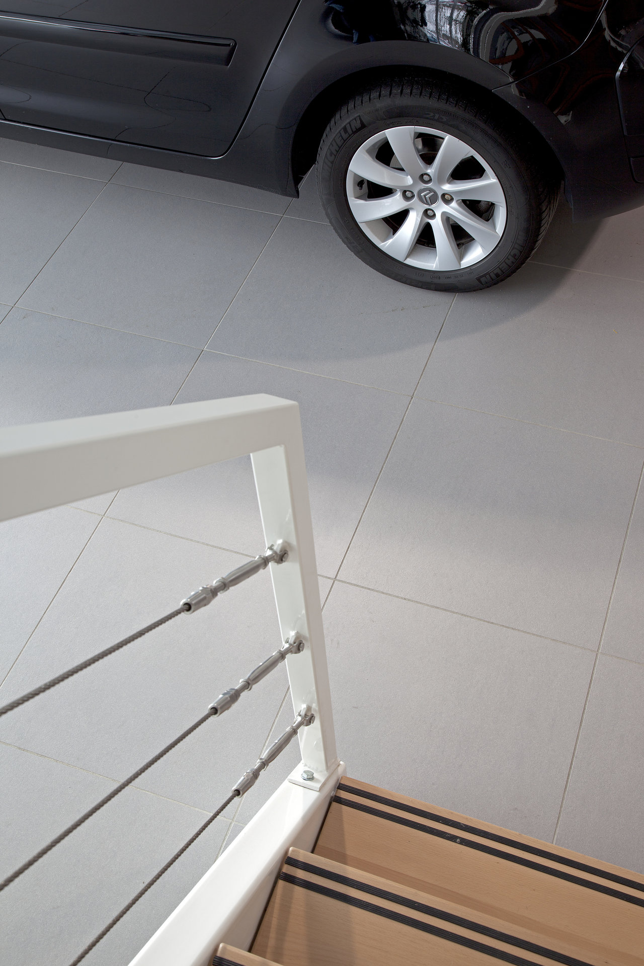 Light, durable indoor tiles, ideal for garages and showrooms.