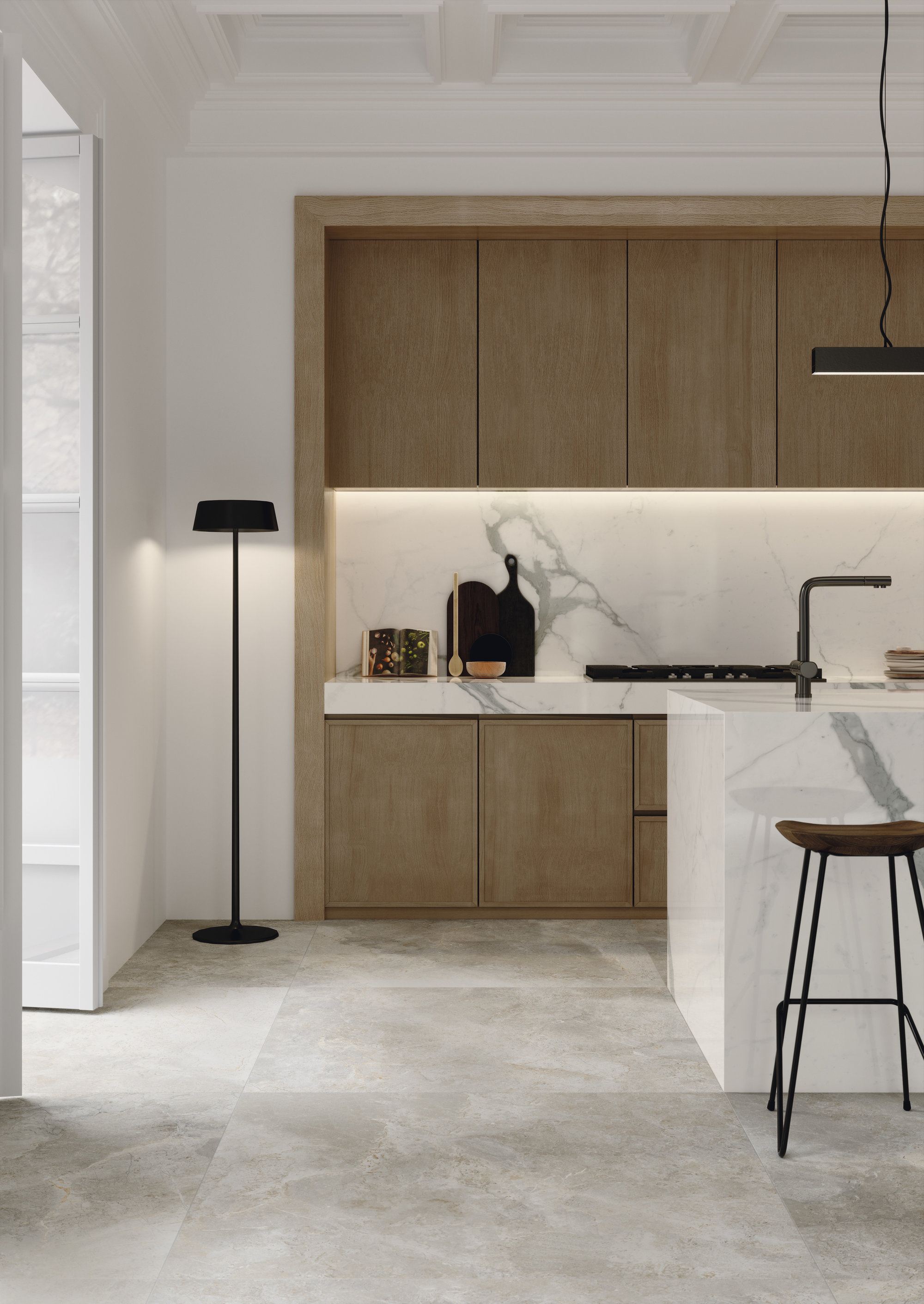 Large-format, light grey marble-look tiles in a modern kitchen.