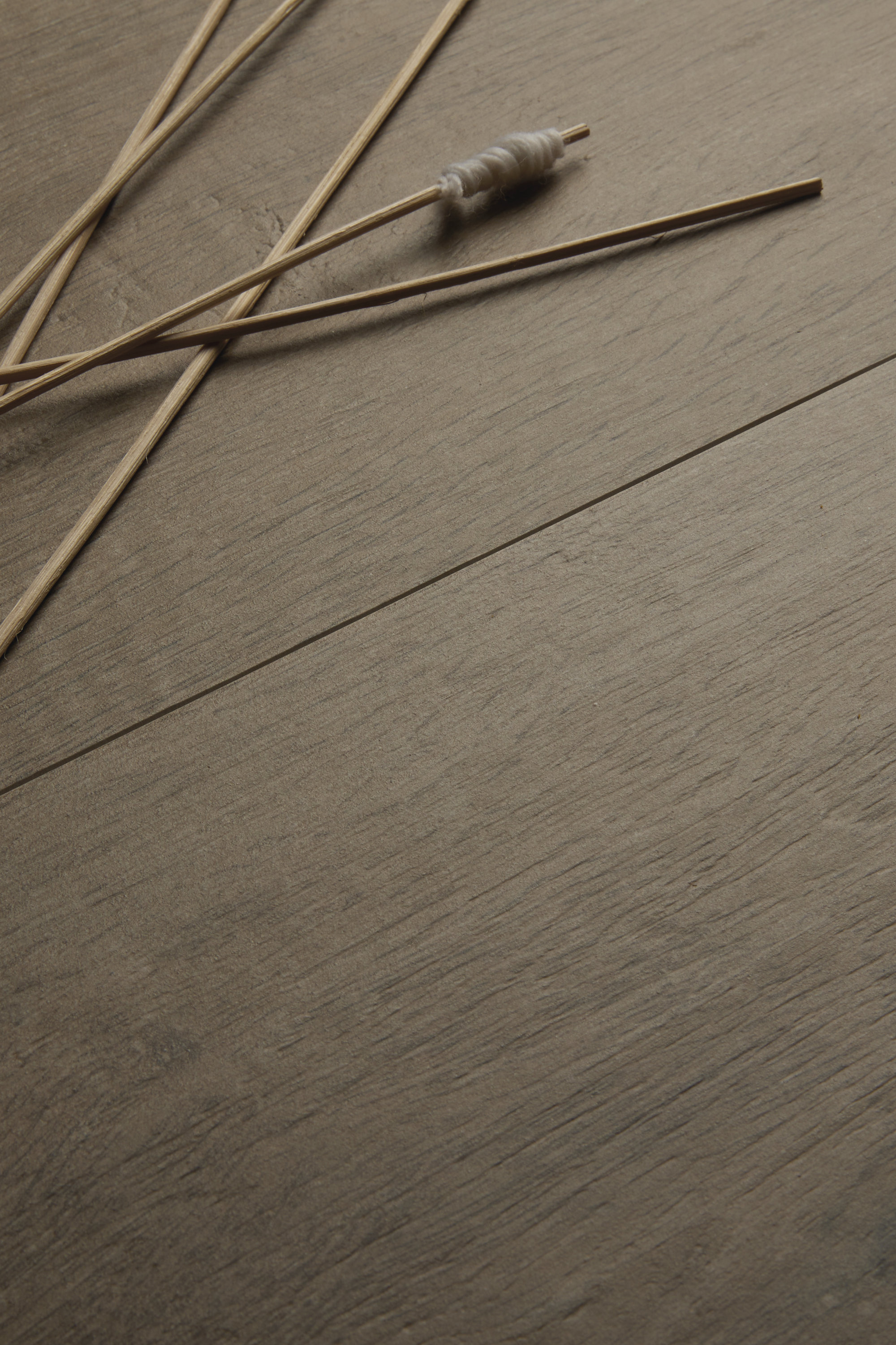 Grey wood-effect tiles with natural grain.
