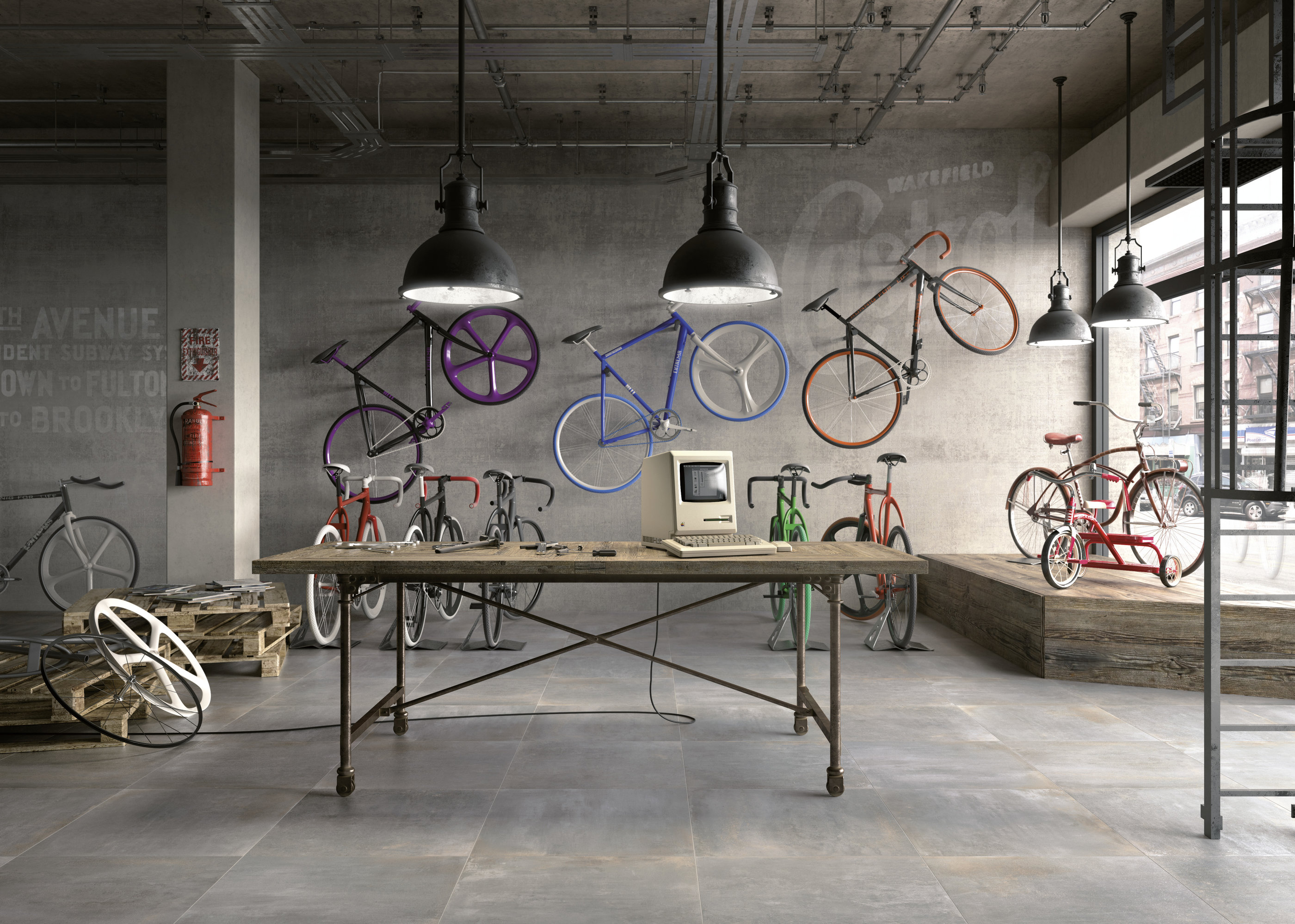 Premium grey concrete-effect tiles in an urban loft with bikes.
