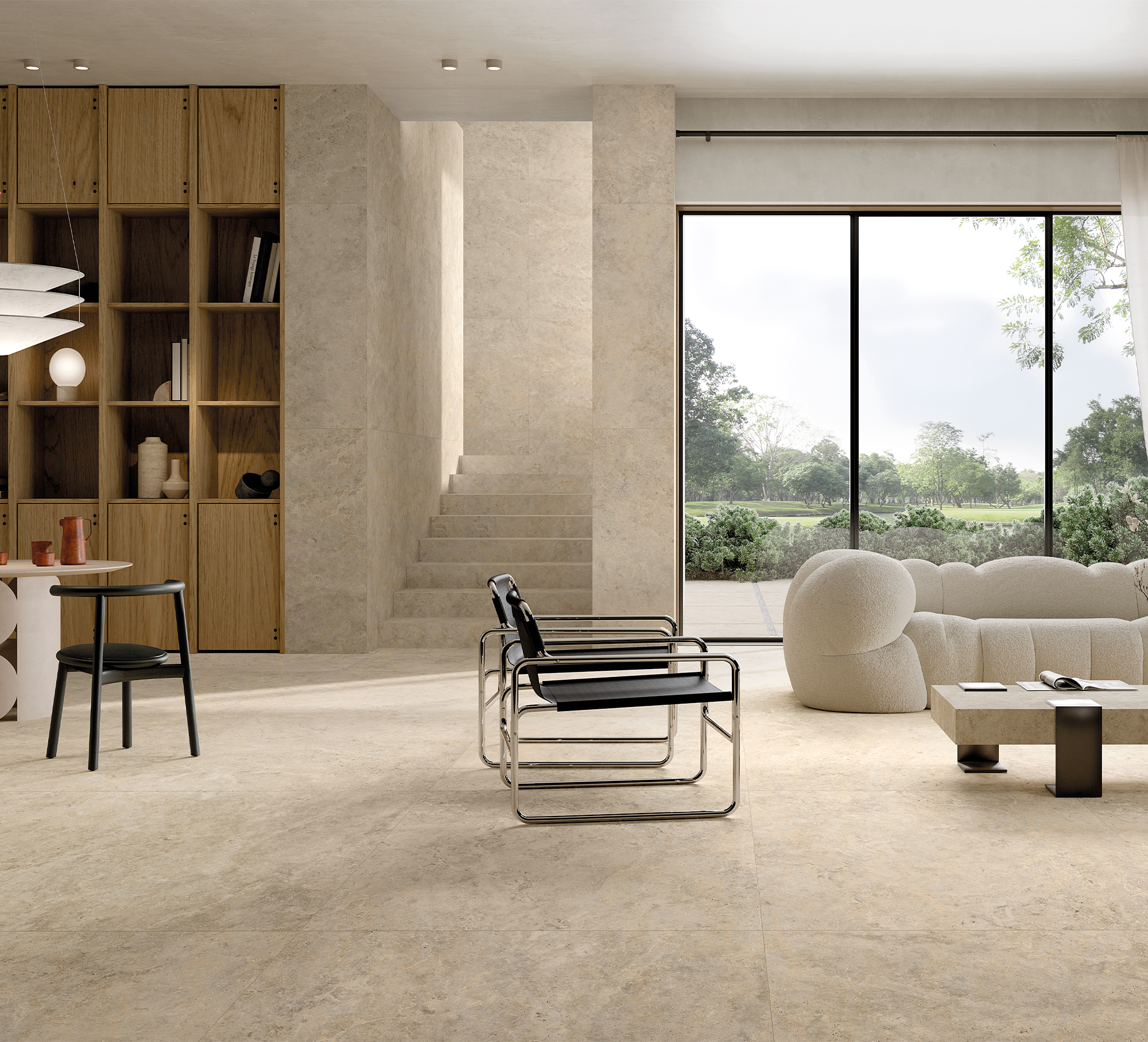 Bright, modern living room with beige floor, wall, and stair tiles, plus garden view.
