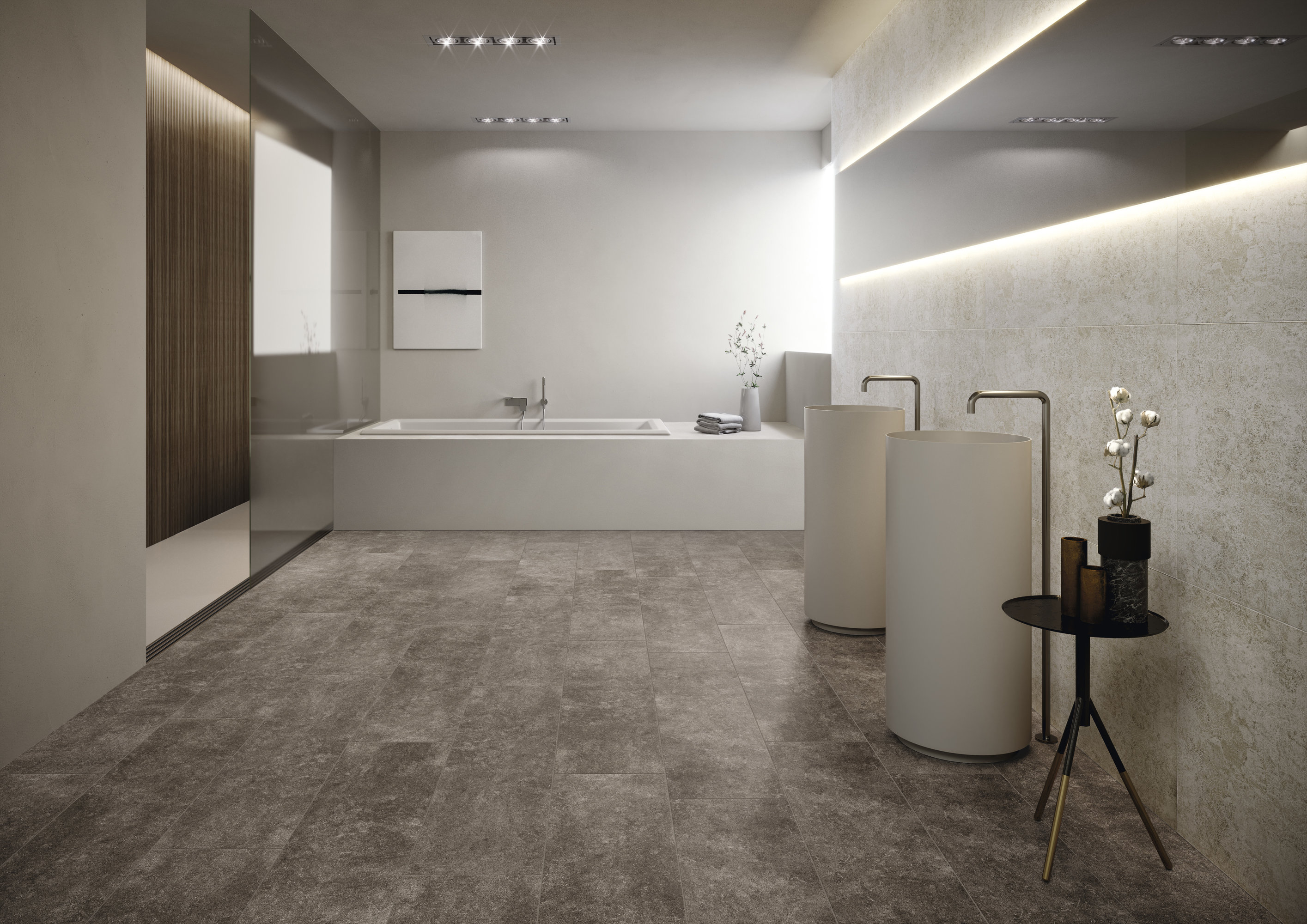 Modern bathroom with elegant grey floor tiles and stylish furnishing.