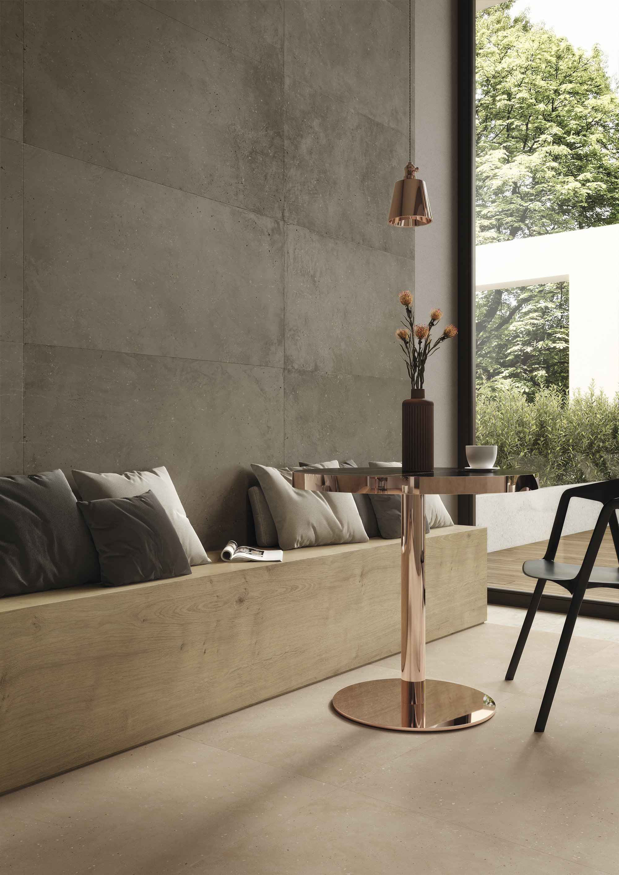 Large-format concrete-effect wall and floor tiles for modern indoor ambiance.