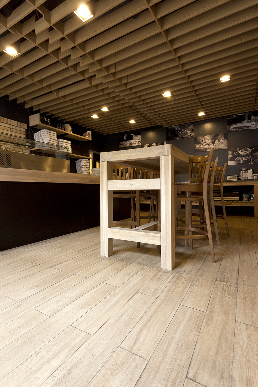 Light wood-effect tile floor in modern interior design.
