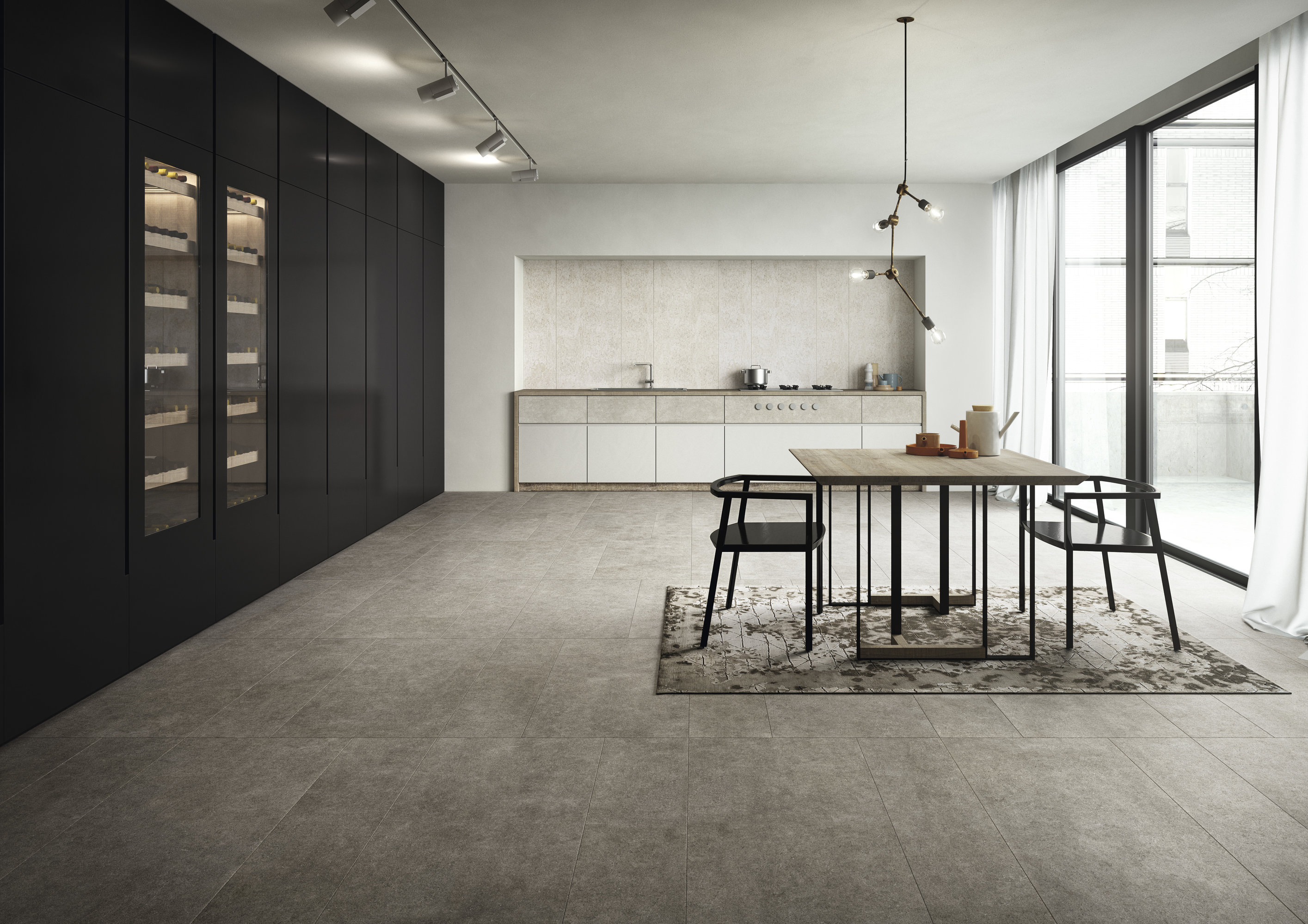 Large-format concrete-look tiles in a modern living-dining area.