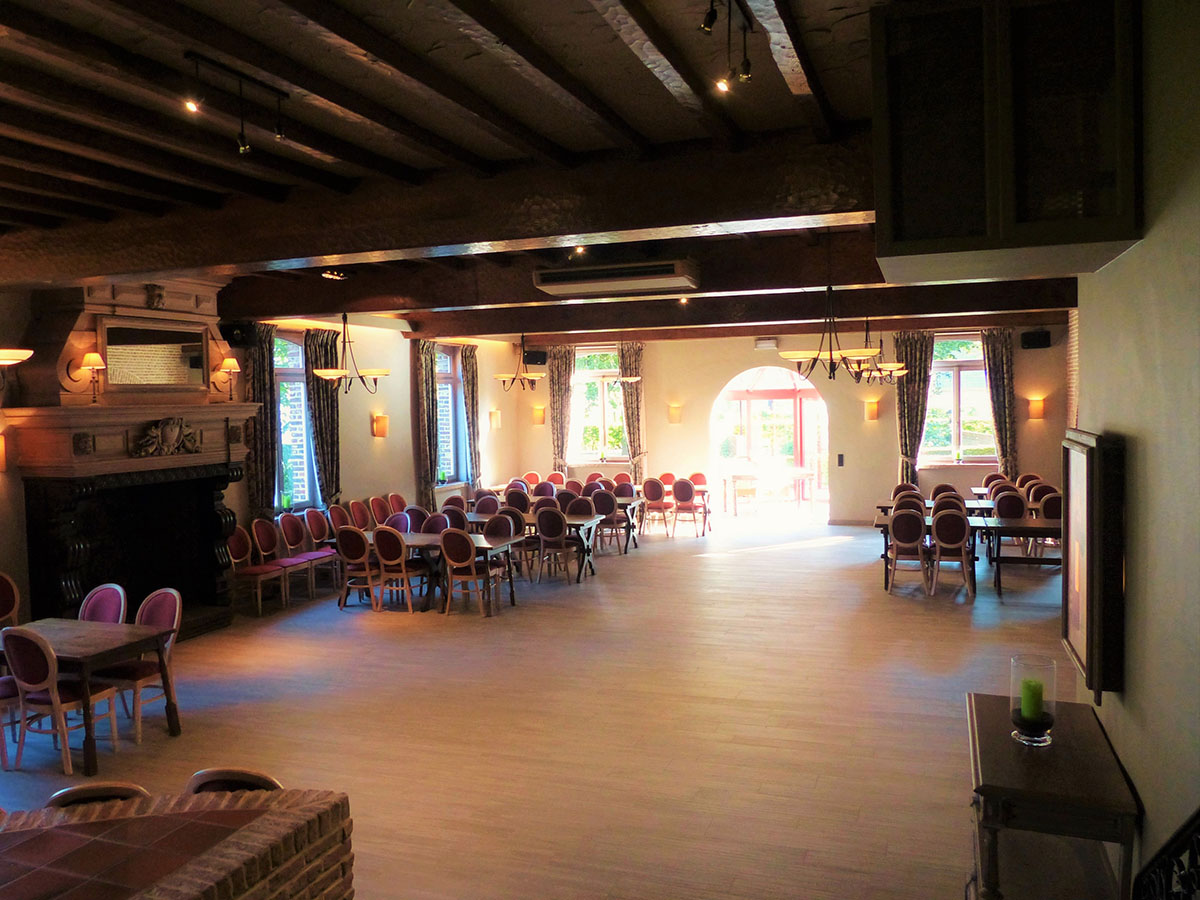 Light tiled floor in a rustic event room.