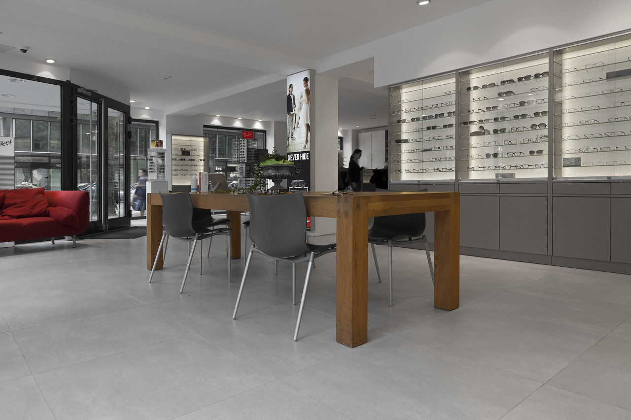 Elegant light grey tile flooring, perfect for modern indoor areas.