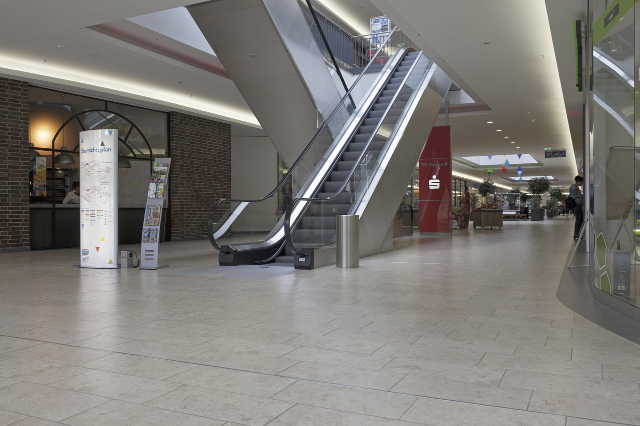 High-quality, light tiles in a modern shopping centre.
