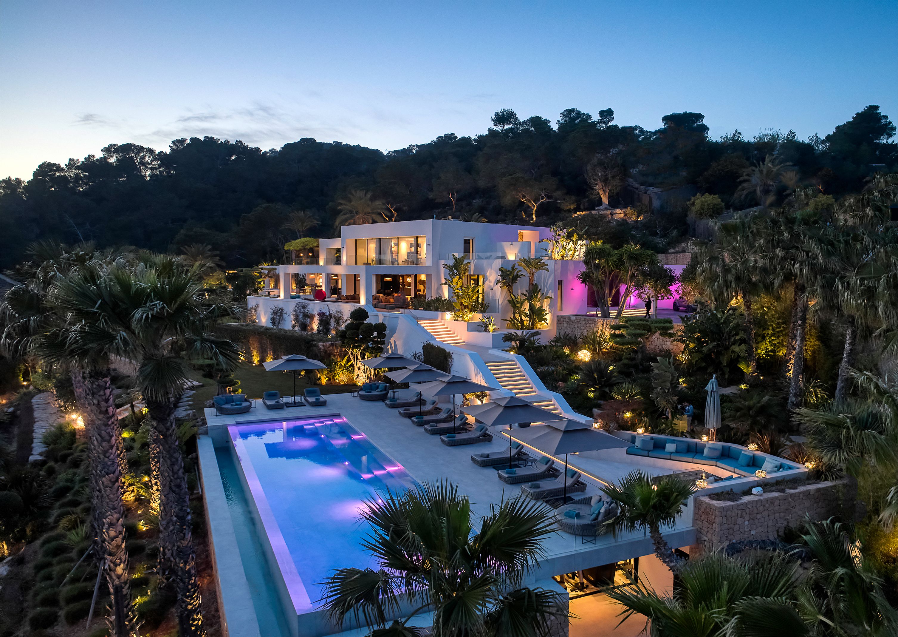 Stunning pool and terrace area of a luxury villa featuring high-quality outdoor tiles.