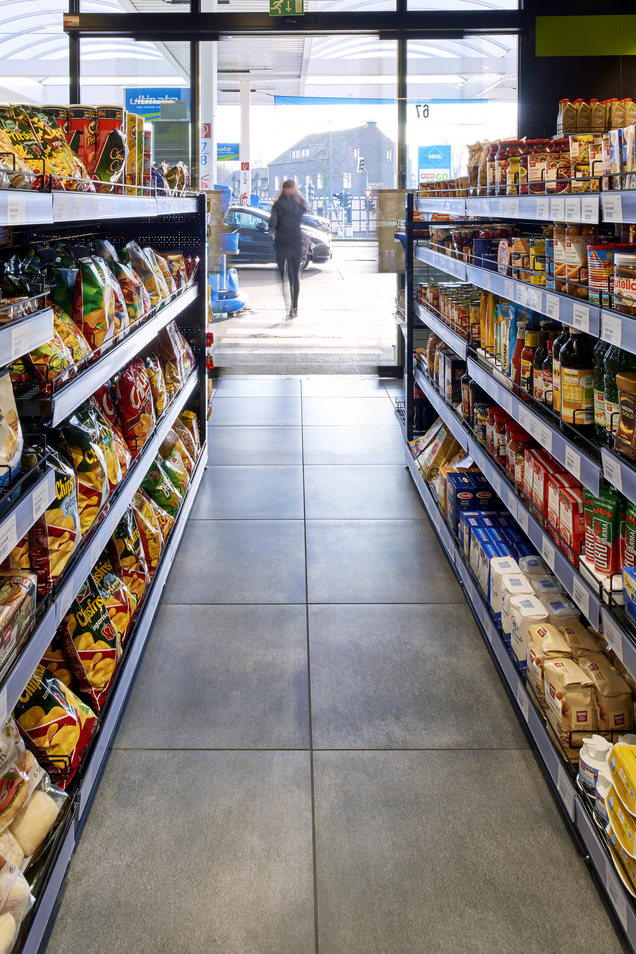 Large, durable grey tiles in a commercial setting, ideal for projects.