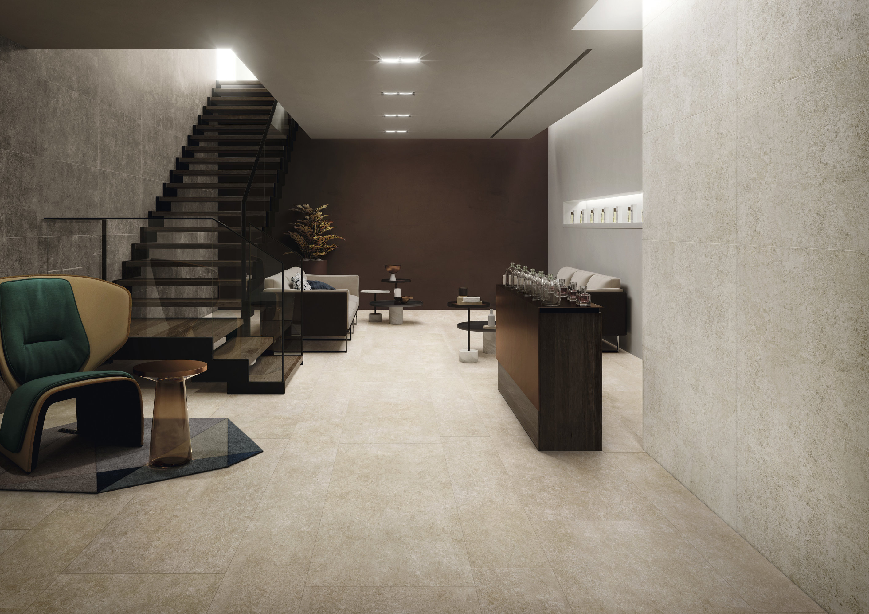 Modern, bright tiles in a spacious interior with staircase and stylish furnishings.