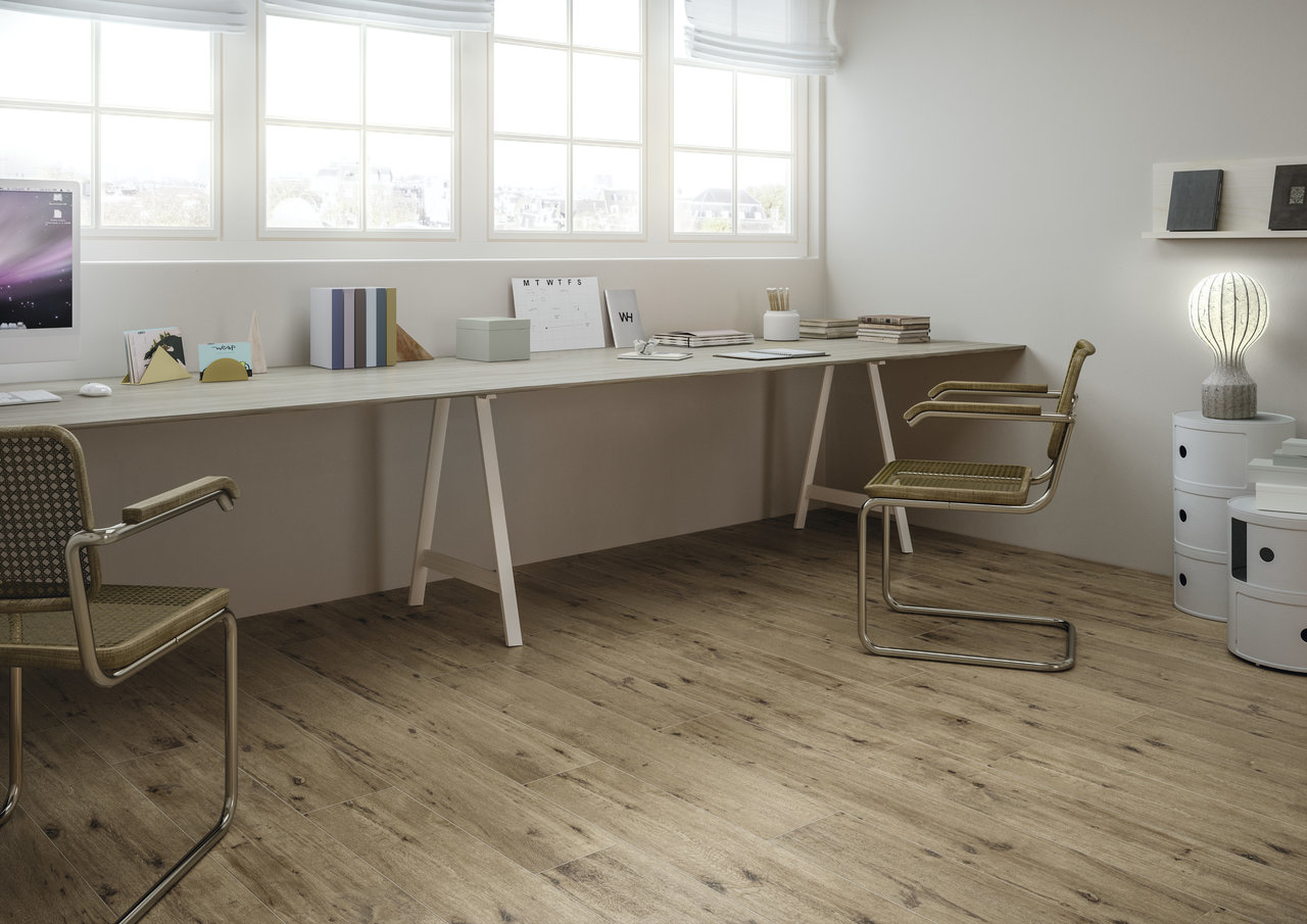 Bright office with Porcelaingres tiles in a warm wood look.