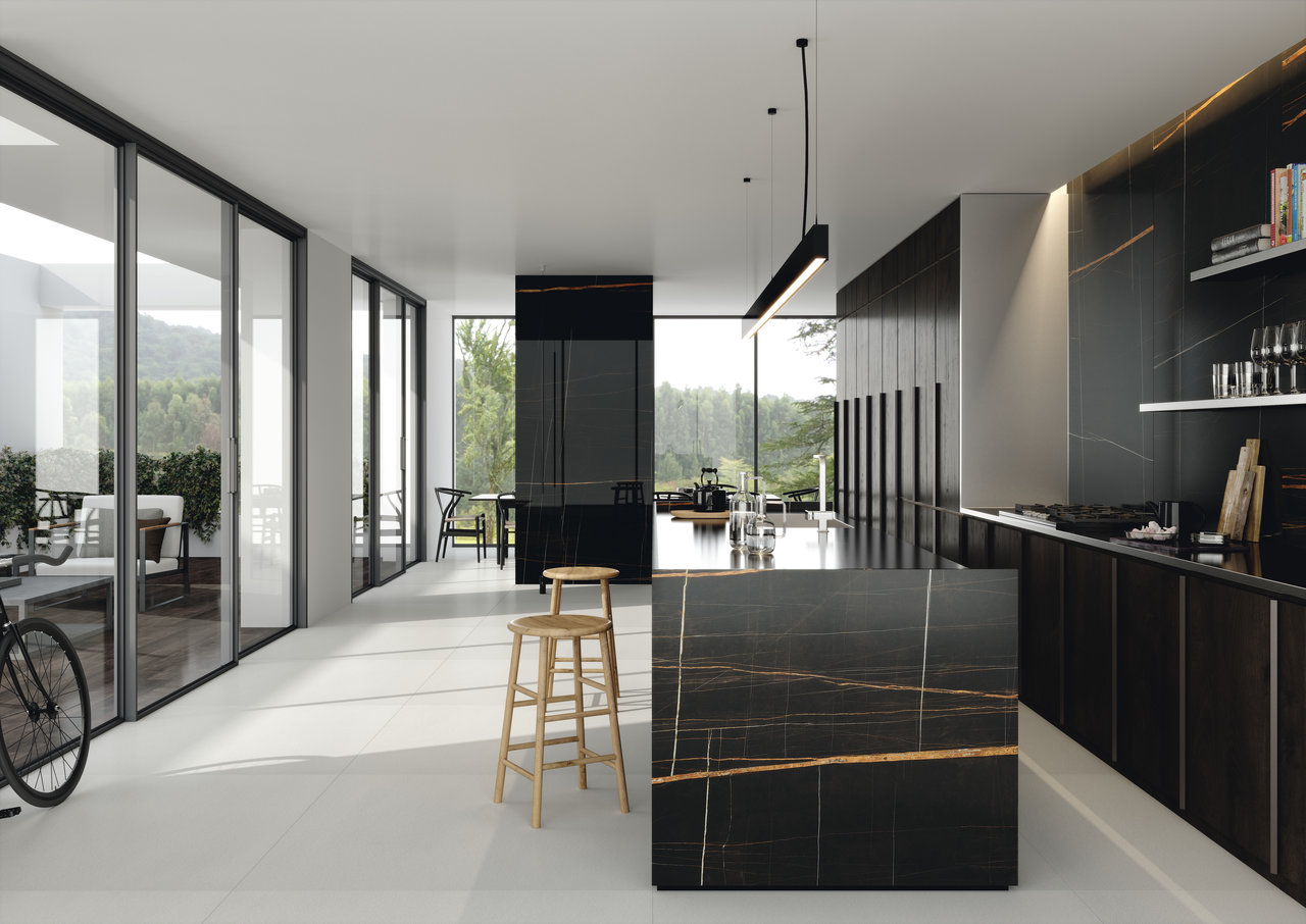Modern kitchen-diner: light floor tiles, dark island with golden veining.