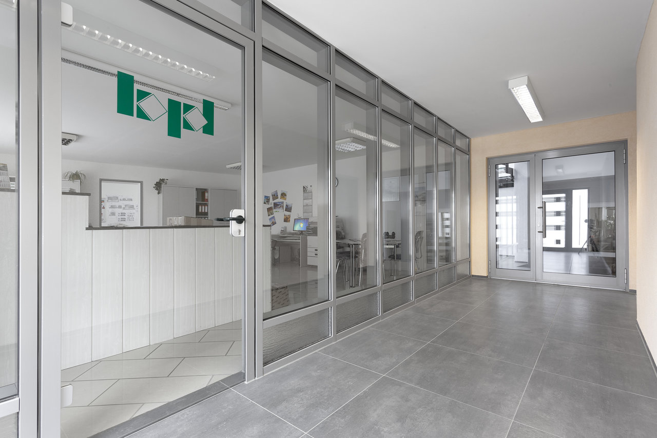 Bright hallway with high-quality grey tiles, ideal for modern interiors.
