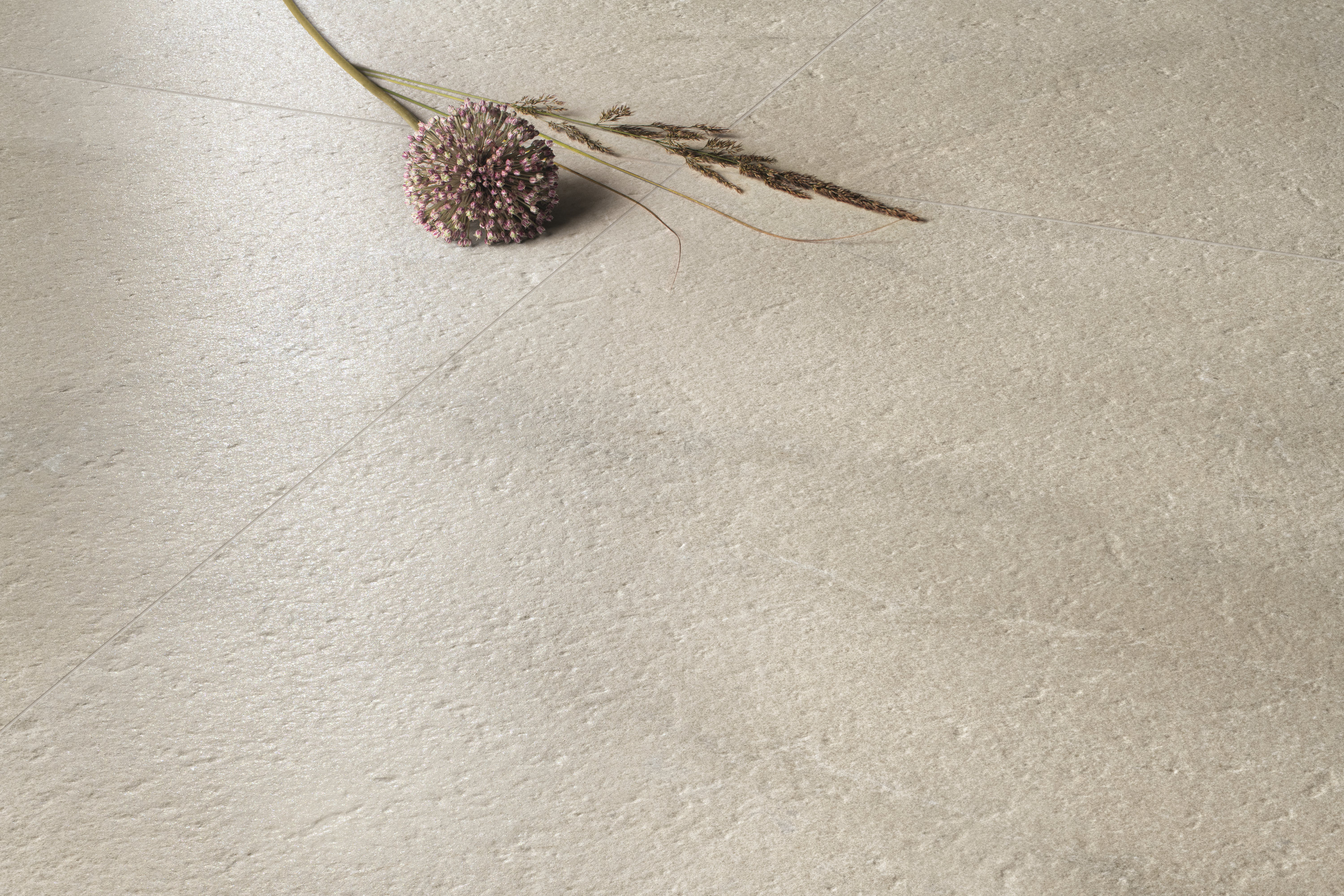 High-quality porcelain stoneware tile in light beige with natural stone look and matt finish.
