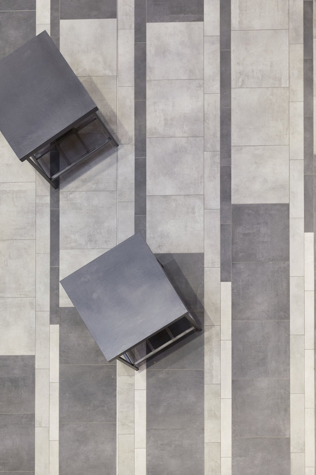 Modern grey and light grey striped tile floor.